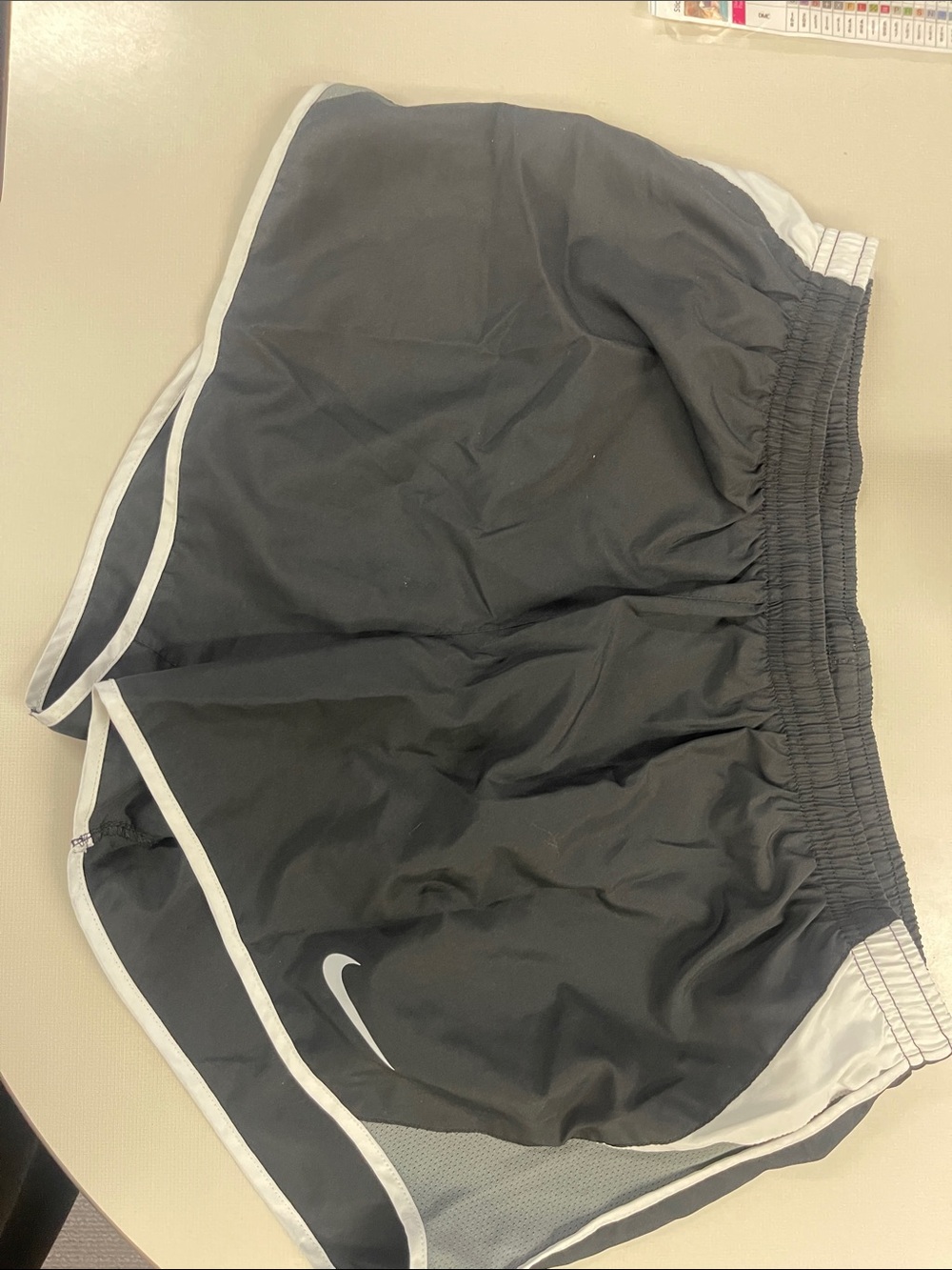 Nike Black Shorts with White Trim and Swoosh